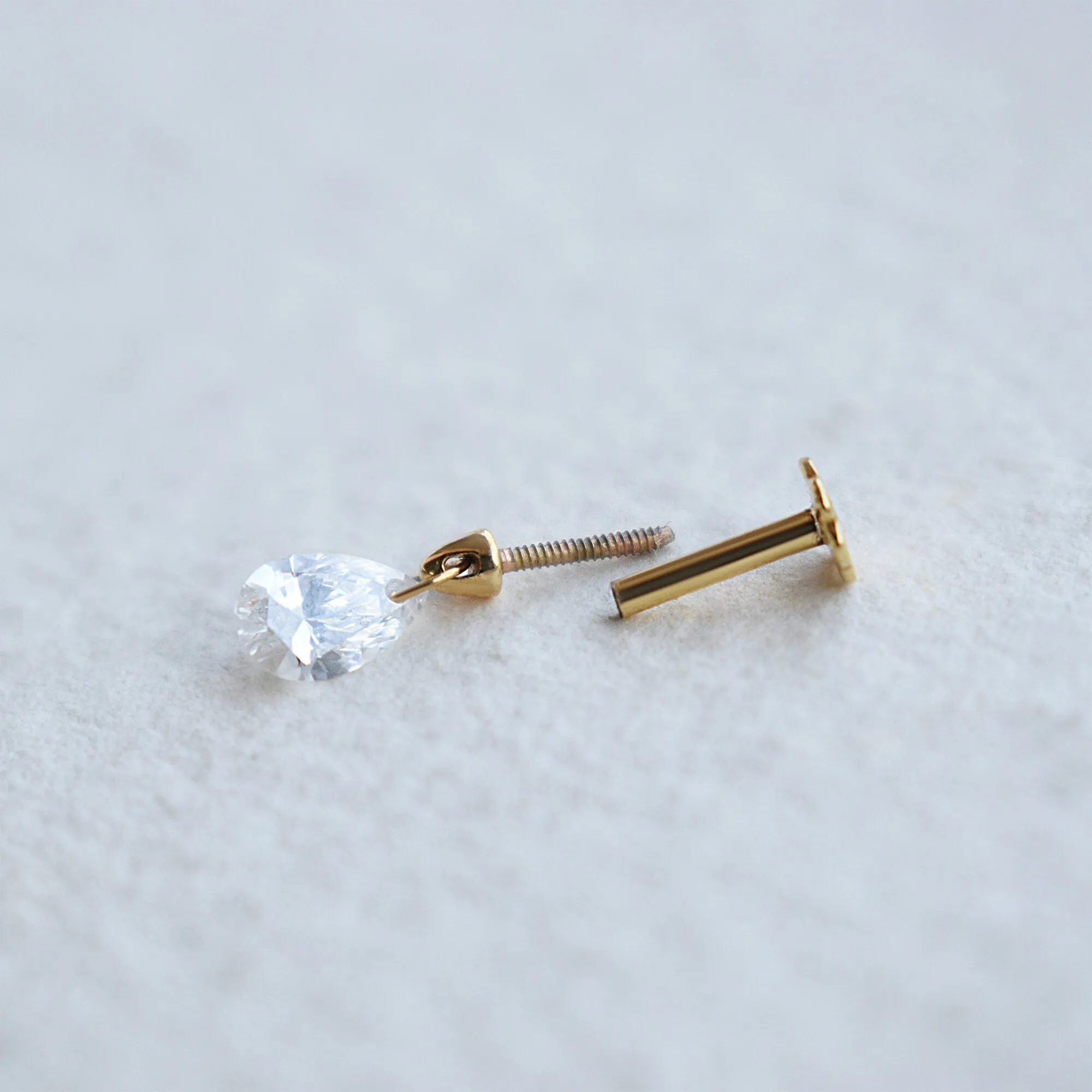 Floating Pear Diamond Stud Earring