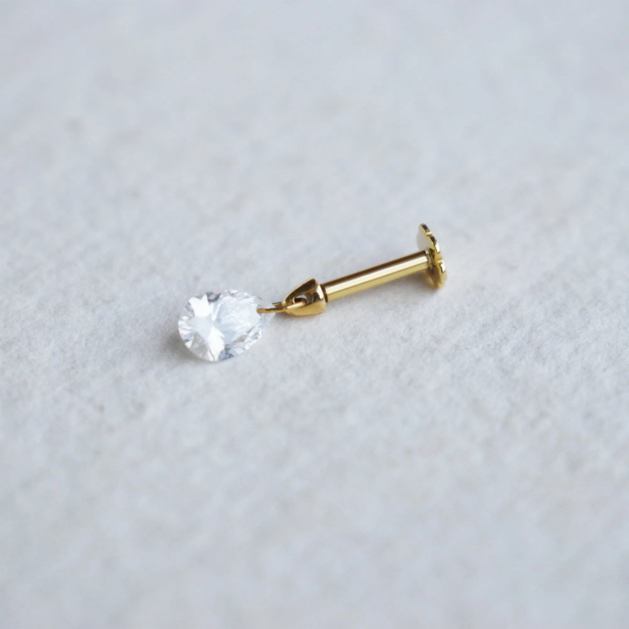 Floating Pear Diamond Stud Earring