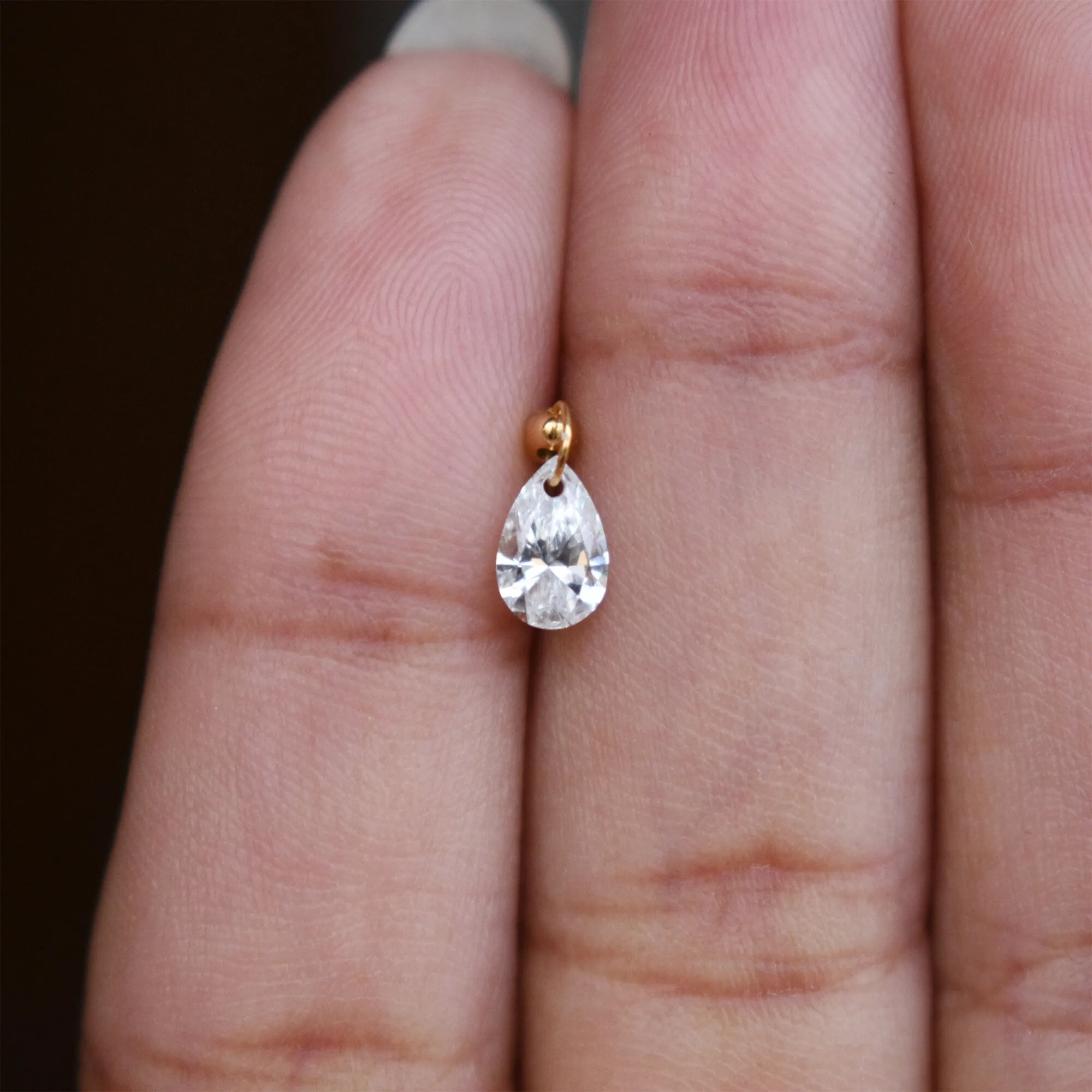 Floating Pear Diamond Stud Earring