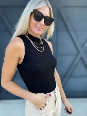 Sleeveless Mock Neck Sweater Knit Top In Black